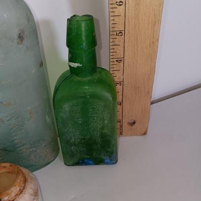 Antique embossed glass bottles - Denver - Lydia Pinkham's Vegi compound and others