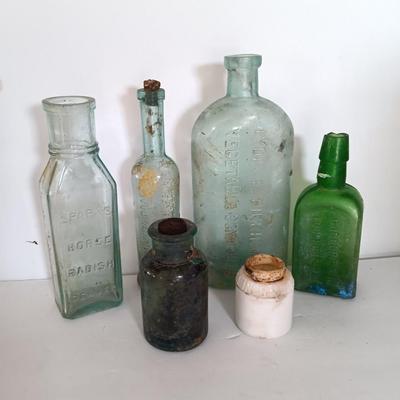 Antique embossed glass bottles - Denver - Lydia Pinkham's Vegi compound and others