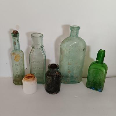Antique embossed glass bottles - Denver - Lydia Pinkham's Vegi compound and others