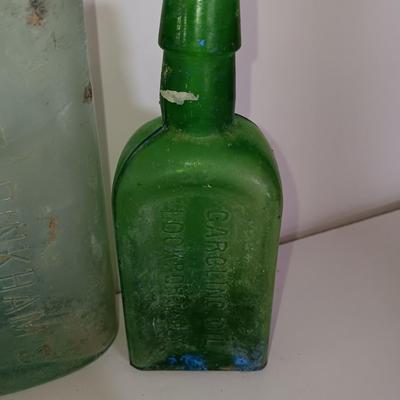 Antique embossed glass bottles - Denver - Lydia Pinkham's Vegi compound and others