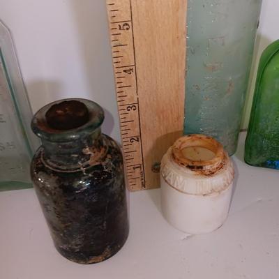 Antique embossed glass bottles - Denver - Lydia Pinkham's Vegi compound and others