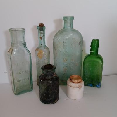 Antique embossed glass bottles - Denver - Lydia Pinkham's Vegi compound and others