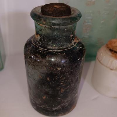 Antique embossed glass bottles - Denver - Lydia Pinkham's Vegi compound and others