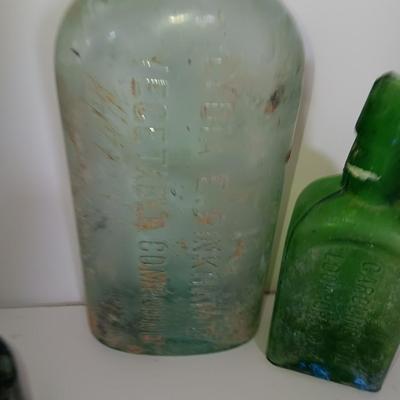 Antique embossed glass bottles - Denver - Lydia Pinkham's Vegi compound and others