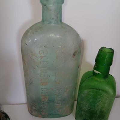 Antique embossed glass bottles - Denver - Lydia Pinkham's Vegi compound and others
