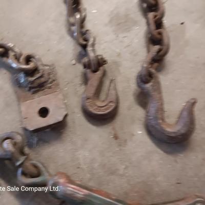 Small pieces of chain - each with a steel hook on the end and a load / chain binder