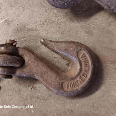 Small pieces of chain - each with a steel hook on the end and a load / chain binder