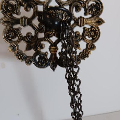 Vintage hardware for cabnitry with shelf hardware and a plastic decorative hanger