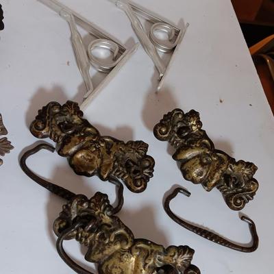 Vintage hardware for cabnitry with shelf hardware and a plastic decorative hanger