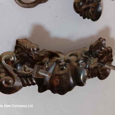 Vintage hardware for cabnitry with shelf hardware and a plastic decorative hanger