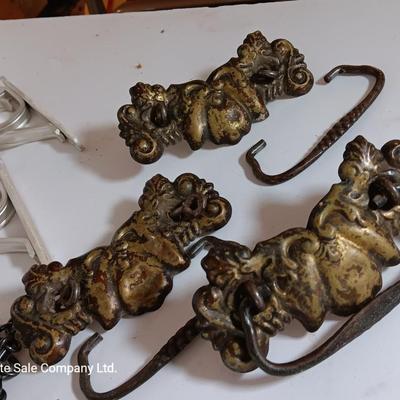 Vintage hardware for cabnitry with shelf hardware and a plastic decorative hanger