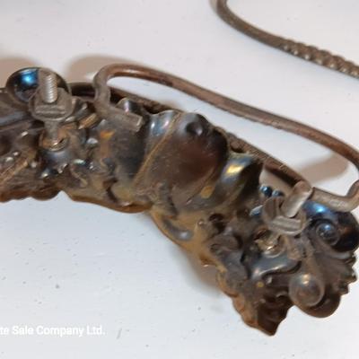 Vintage hardware for cabnitry with shelf hardware and a plastic decorative hanger