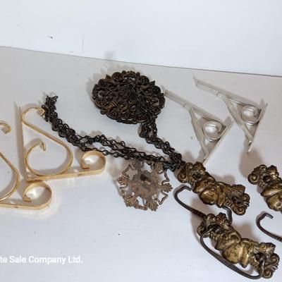 Vintage hardware for cabnitry with shelf hardware and a plastic decorative hanger