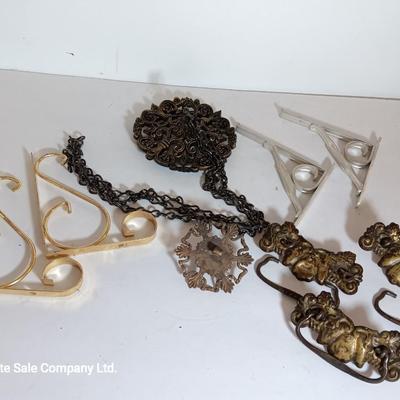 Vintage hardware for cabnitry with shelf hardware and a plastic decorative hanger