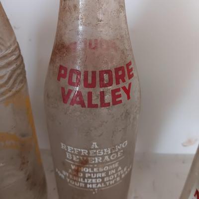 Antique painted lable beverage bottles - Fort Collins - Greeley co. and Chicago Soda bottles