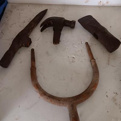 Antique heads to tools - hammer - prod - primitive pick - and ax