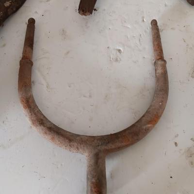 Antique heads to tools - hammer - prod - primitive pick - and ax