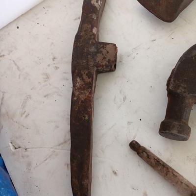 Antique heads to tools - hammer - prod - primitive pick - and ax