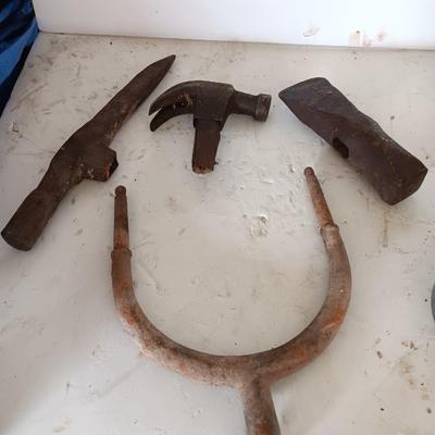 Antique heads to tools - hammer - prod - primitive pick - and ax