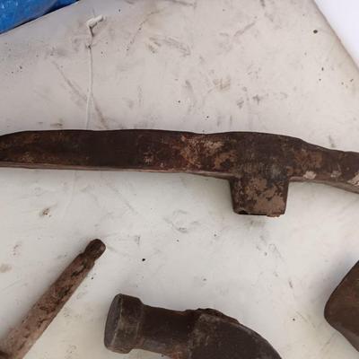 Antique heads to tools - hammer - prod - primitive pick - and ax