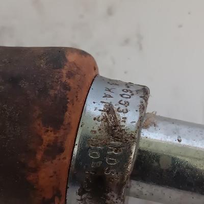 Two antique electric soldering irons with different sized heads