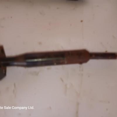 Two antique electric soldering irons with different sized heads