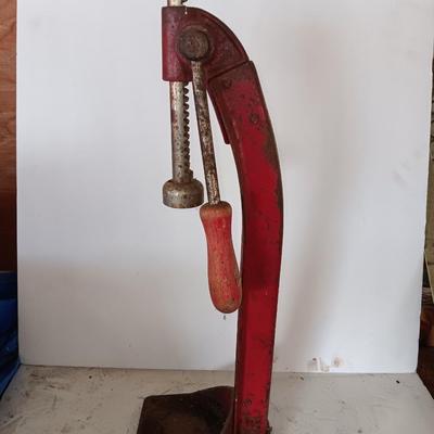 Vintage bottle cork machine hand crank with vintage glass bottles