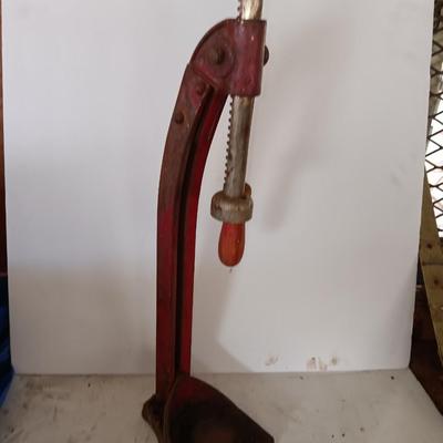 Vintage bottle cork machine hand crank with vintage glass bottles