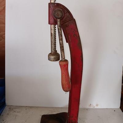 Vintage bottle cork machine hand crank with vintage glass bottles