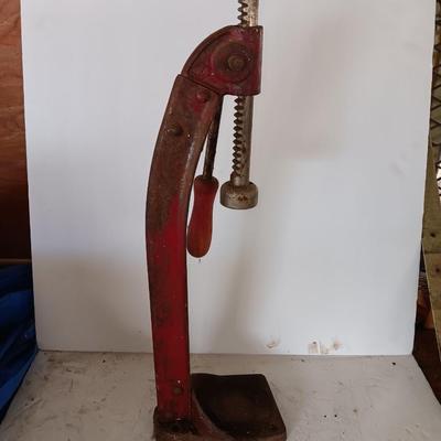 Vintage bottle cork machine hand crank with vintage glass bottles