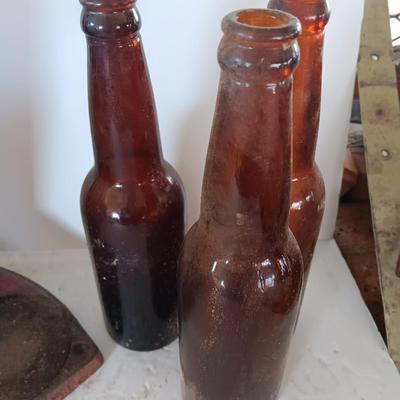 Vintage bottle cork machine hand crank with vintage glass bottles