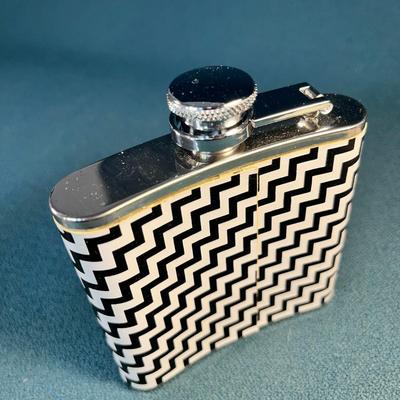 "DRAMBUIE" STAINLESS STEEL 5 0Z. FLASK WITH BLACK, WHITE ZIG ZAG PATTERN 