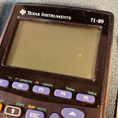 TEXAS INSTRUMENTS TI-89 ELECTRONIC CALCULATOR WITH COVER