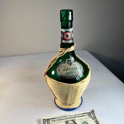 CHIANTI WINE BOTTLE WITH RUSH WRAPPING AND FANCY LABELS