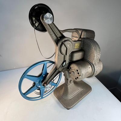"BRIGHTBEAM" VINTAGE 8MM MOVIE PROJECTOR by KEYSTONE w/ FILM LOADED IN IT