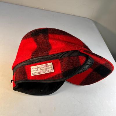 RED, BLACK PLAID FILSON WOOL OUTDOORSMAN'S CAP WITH EAR FLAPS, BRIM