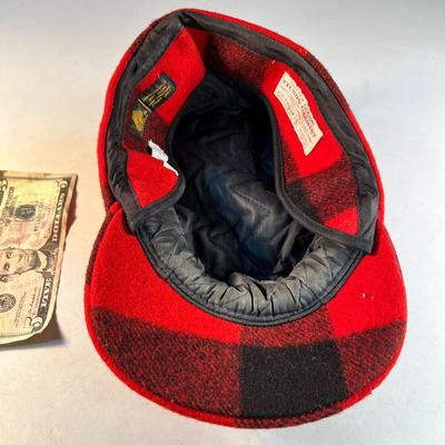 RED, BLACK PLAID FILSON WOOL OUTDOORSMAN'S CAP WITH EAR FLAPS, BRIM