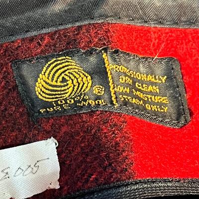 RED, BLACK PLAID FILSON WOOL OUTDOORSMAN'S CAP WITH EAR FLAPS, BRIM