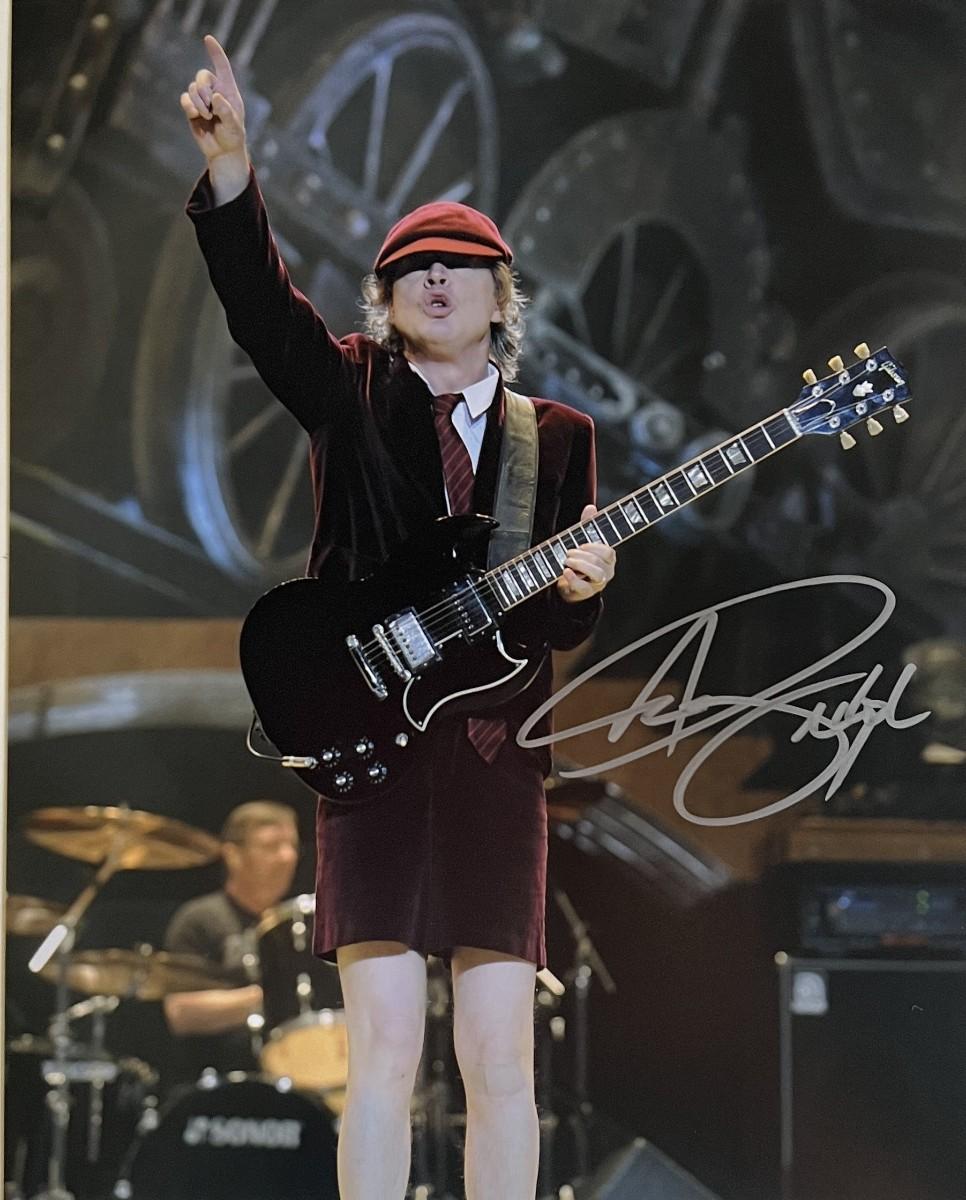 AC/DC Angus Young signed photo | EstateSales.org