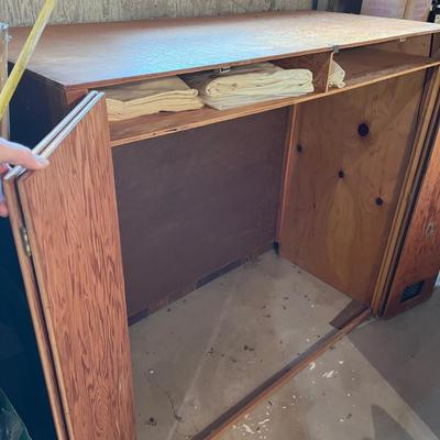 Roll away bed with cabinet