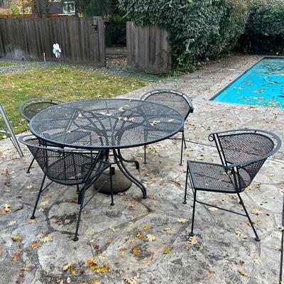 Patio furniture set, table, and four chairs