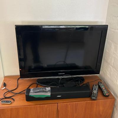 Used flatscreen TV and Bose sound bar