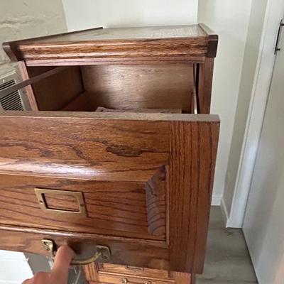 Four drawer wooden file cabinet
