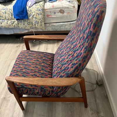 MCM, modern dux, chair, and ottoman made in Sweden