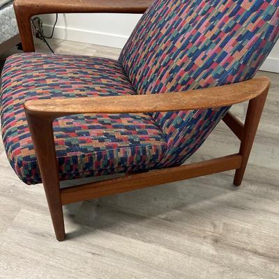 MCM, modern dux, chair, and ottoman made in Sweden