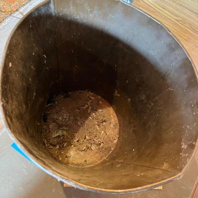 Antique metal trash can