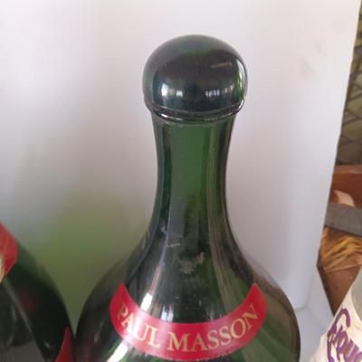 Vintage empty glass bottles with labels