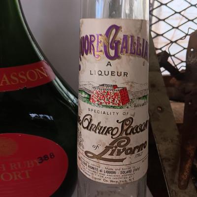 Vintage empty glass bottles with labels
