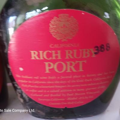 Vintage empty glass bottles with labels