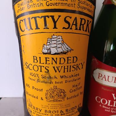 Vintage empty glass bottles with labels